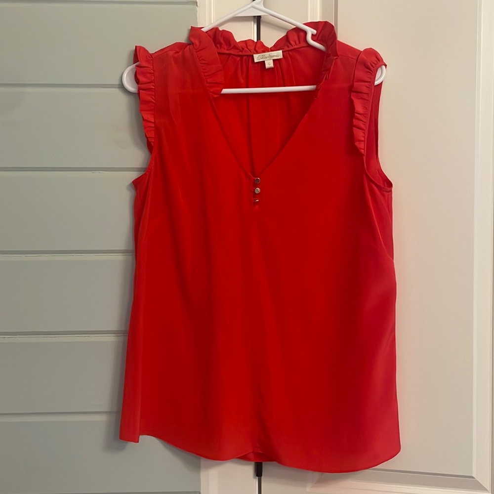 Silk with ruffle around top portion